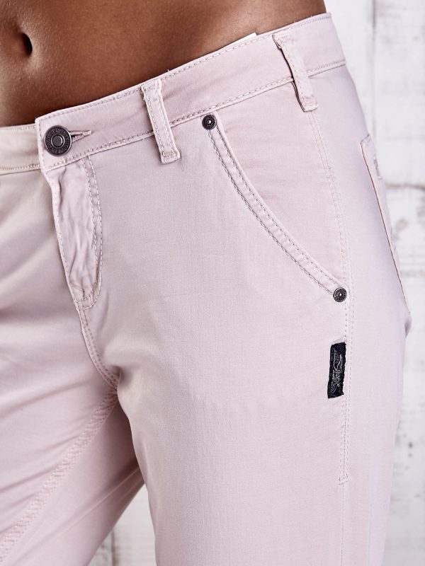 Wholesale Light beige fabric trousers with stitching on pockets