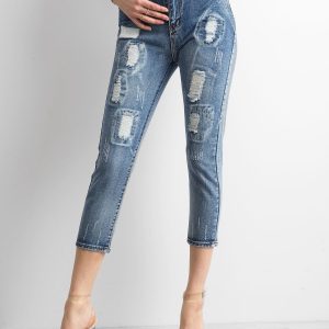 Wholesale Blue jeans with abrasions and wash effect