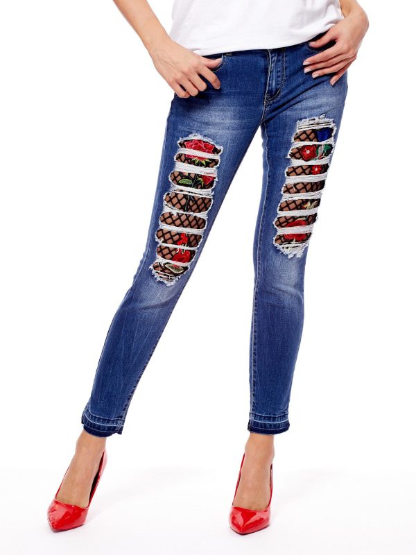 Wholesale Blue jeans with floral inserts