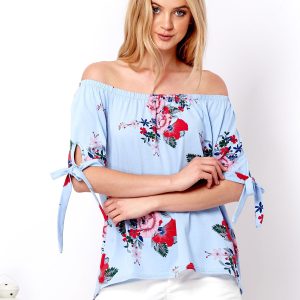 Wholesale Blue Spanish blouse with floral patterns