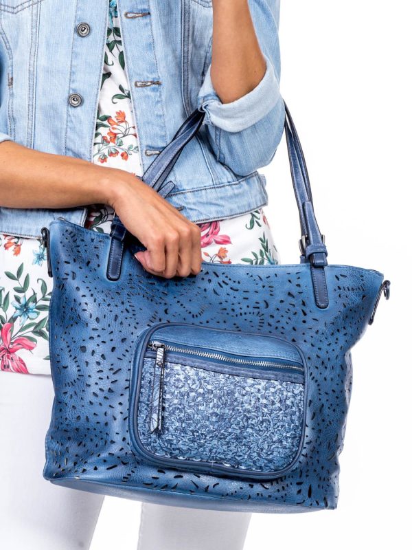 Wholesale Blue handbag with openwork and braid