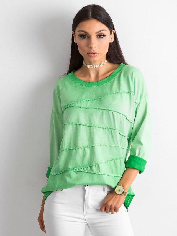 Wholesale Green blouse with asymmetrical stitching