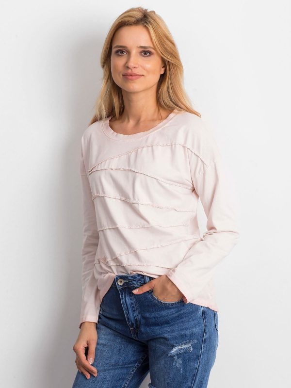 Wholesale Light pink blouse with asymmetrical stitching